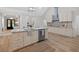Modern kitchen with granite countertops, stainless steel appliances, and a kitchen island with sink at 332 Mount Zion Rd, Oxford, GA 30054