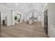 Open-concept kitchen featuring lots of space, island with barstool seating and view to dining and living rooms at 332 Mount Zion Rd, Oxford, GA 30054