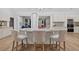 Stylish kitchen island with bar seating and granite countertop provides a place for casual dining at 332 Mount Zion Rd, Oxford, GA 30054