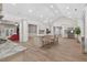 Stylish kitchen with granite counters, island seating, and open access to other living spaces at 332 Mount Zion Rd, Oxford, GA 30054