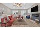 Elegant living room with hardwood floors, modern fireplace, recessed lighting, and an open-concept layout at 332 Mount Zion Rd, Oxford, GA 30054