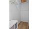 Image shows a walk-in closet space in a home with vinyl wood flooring at 332 Mount Zion Rd, Oxford, GA 30054