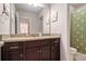 Bathroom with granite countertops, a decorative shower curtain, and ample space at 6213 Old Kingston Dr, Atlanta, GA 30331