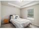 Bedroom with cozy decor, including a comfortable bed, window, and nightstand, creating a welcoming atmosphere at 6213 Old Kingston Dr, Atlanta, GA 30331