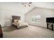 Spacious bedroom with high ceilings, large windows, and ample room for a king-size bed and furniture at 6213 Old Kingston Dr, Atlanta, GA 30331