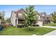 Attractive home featuring a well-maintained lawn, brick and siding exterior, and a cozy front porch at 6213 Old Kingston Dr, Atlanta, GA 30331