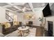Cozy living room boasts hardwood floors, a fireplace, coffered ceilings, and stylish decor at 6213 Old Kingston Dr, Atlanta, GA 30331