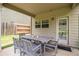 Inviting outdoor patio with dining set, offering a great space for entertaining guests at 6213 Old Kingston Dr, Atlanta, GA 30331