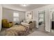 Comfortable sitting room with stylish furniture, a decorative rug, and a view into the bedroom and bathroom at 6213 Old Kingston Dr, Atlanta, GA 30331