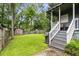 Spacious backyard includes a shed, mature trees, and room for recreation at 1148 Ne Hardee Ne St, Atlanta, GA 30307