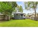 Large backyard features lush green grass, a back porch and privacy fencing at 1148 Ne Hardee Ne St, Atlanta, GA 30307