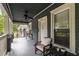 Comfortable front porch with seating, perfect for enjoying the outdoors in this charming home at 1148 Ne Hardee Ne St, Atlanta, GA 30307