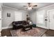 Inviting living room with hardwood floors, natural light, and a classic fireplace feature at 1148 Ne Hardee Ne St, Atlanta, GA 30307