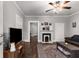 Bright living room with hardwood floors, fireplace, and comfortable furnishings perfect for relaxing at 1148 Ne Hardee Ne St, Atlanta, GA 30307
