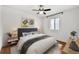 Cozy bedroom with a large bed, stylish decor, and a bright window, perfect for relaxing at 1355 Euclid Ne Ave # A8, Atlanta, GA 30307