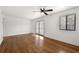 Bright living room features hardwood floors and a ceiling fan; natural light abounds at 1355 Euclid Ne Ave # A8, Atlanta, GA 30307