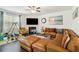 Inviting living room featuring a fireplace, hardwood floors, and a comfortable seating area at 1469 Cliff View Ter, Conyers, GA 30012