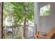 Inviting balcony with lush green views, perfect for enjoying the outdoors, equipped with wood chairs at 15 Waddell Ne St # 101, Atlanta, GA 30307