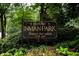 Historic Inman Park sign surrounded by lush greenery, marking Atlanta's first suburb circa 1890 at 15 Waddell Ne St # 101, Atlanta, GA 30307