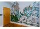 Entryway with a unique floral wall mural and hardwood floors at 15 Waddell Ne St # 101, Atlanta, GA 30307