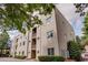 Stylish building exterior featuring balconies and lush greenery at 15 Waddell Ne St # 101, Atlanta, GA 30307