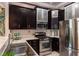 Well-equipped kitchen with stainless steel appliances, granite counters, and modern finishes at 15 Waddell Ne St # 101, Atlanta, GA 30307