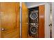 Convenient laundry room with stacked washer and dryer units, maximizing space in the home at 15 Waddell Ne St # 101, Atlanta, GA 30307