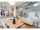 Open concept living and dining area with hardwood floors, modern decor, and lots of light at 15 Waddell Ne St # 101, Atlanta, GA 30307