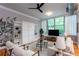 Bright living room with stylish built-ins and hardwood floors at 15 Waddell Ne St # 101, Atlanta, GA 30307