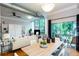 Inviting living room with hardwood floors, large windows, and an adjacent dining area at 15 Waddell Ne St # 101, Atlanta, GA 30307