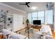 Bright living room featuring a Murphy bed and hardwood floors at 15 Waddell Ne St # 101, Atlanta, GA 30307
