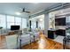 Open concept living area features hardwood floors, neutral decor, and a cozy seating arrangement at 15 Waddell Ne St # 101, Atlanta, GA 30307