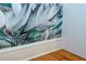 Detail view of signed mural and hardwood floors at 15 Waddell Ne St # 101, Atlanta, GA 30307