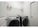 Clean laundry room with new front load washer and dryer at 6403 Queens Court Trce, Mableton, GA 30126