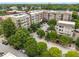 An aerial view of the apartment community featuring lush landscaping, street parking, and ample outdoor space at 898 Oak Sw St # 1301, Atlanta, GA 30310