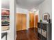 Entryway featuring wood floors, closet space, and access to the kitchen and main entry door at 898 Oak Sw St # 1301, Atlanta, GA 30310