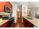 Kitchen with granite countertops and stainless steel appliances, next to the dining and living areas at 898 Oak Sw St # 1301, Atlanta, GA 30310