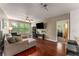 Living room with natural light from large windows and a view into the connected main bedroom at 898 Oak Sw St # 1301, Atlanta, GA 30310