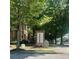 Sky Lofts brick signage on corner lot with mature trees and street parking gives community a welcoming ambiance at 898 Oak Sw St # 1301, Atlanta, GA 30310