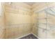 Spacious walk-in closet with multiple shelves and hanging racks for optimal storage at 898 Oak Sw St # 1301, Atlanta, GA 30310