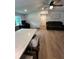 Open concept living room features light countertops and modern flooring at 241 Wooten Ct, Canton, GA 30114