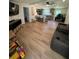 Inviting living room with a modern open layout, flowing seamlessly into a stylish kitchen and dining area at 241 Wooten Ct, Canton, GA 30114