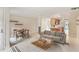 Inviting open concept features living, dining, and kitchen, with tile floors and neutral tones throughout at 3268 Clairmont North Ne Rd, Brookhaven, GA 30329