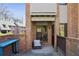 Private brick patio features outdoor seating and view of townhouse complex at 3268 Clairmont North Ne Rd, Brookhaven, GA 30329