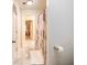 Hallway bathroom features a white door and a tiled floor leading to the bathroom at 350 Fountain Oaks Ln, Atlanta, GA 30342