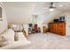 Attic bedroom provides a cozy feel with a desk, dresser, and slanted ceilings at 350 Fountain Oaks Ln, Atlanta, GA 30342
