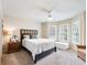 Well-lit bedroom with plantation shutters and stylish decor, creating a serene atmosphere at 350 Fountain Oaks Ln, Atlanta, GA 30342