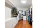 Walk-in closet boasts custom shelving and organization for clothing and accessories at 350 Fountain Oaks Ln, Atlanta, GA 30342