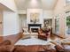 Living room with hardwood floors and a fireplace at 350 Fountain Oaks Ln, Atlanta, GA 30342