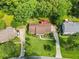 Aerial view of home and neighborhood with mature trees and landscaping at 621 Windgrove Se Dr, Marietta, GA 30067